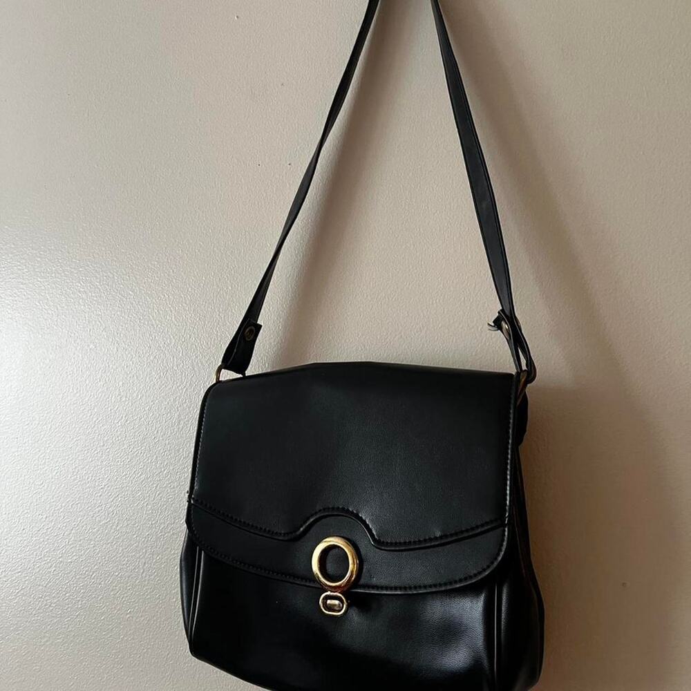 Vintage black and gold shoulder